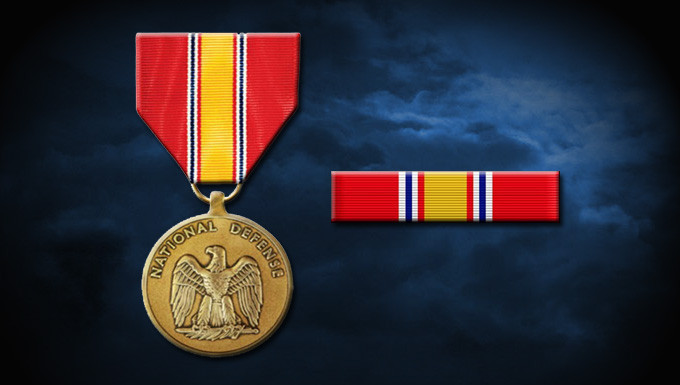 Close-up of the National Defense Service Medal, showcasing its ribbon design.