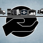 A simplified illustration of a hand holding a tray with a delivery truck, fuel drum, construction materials, medical supplies, storage and a forklift