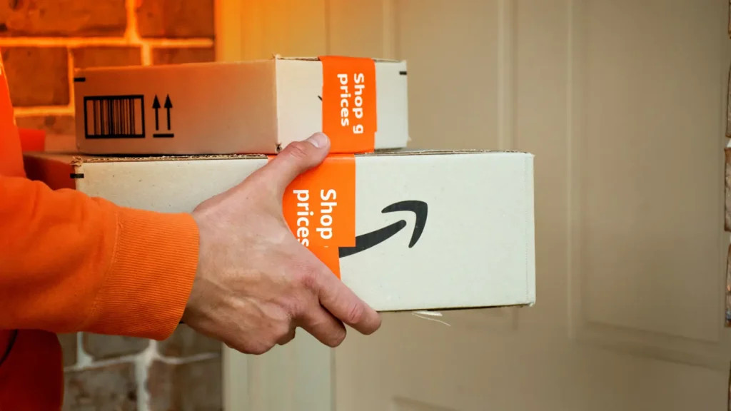 An assortment of Amazon branded packages being sorted at a USPS facility, highlighting Sunday delivery operations