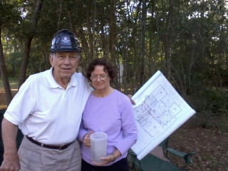 John Moore with his son Keith reviewing blueprints.