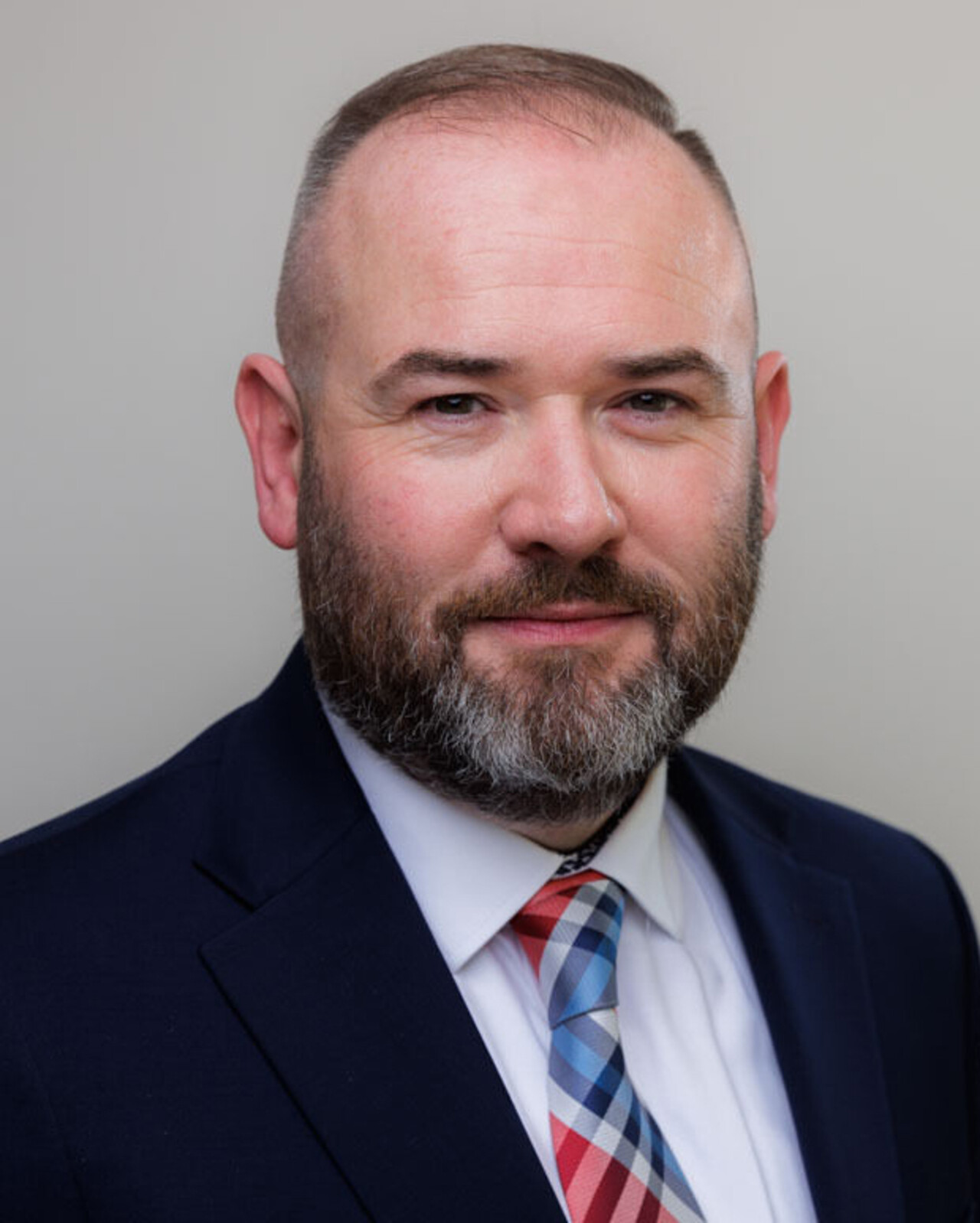 Calum Laming, British Airways Chief Customer Officer, headshot showcasing airline leadership.