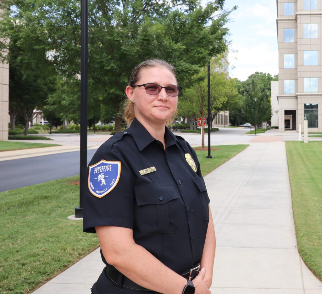 Female Security Officer in Military Style Uniform, Showcasing Diverse Local Security Personnel