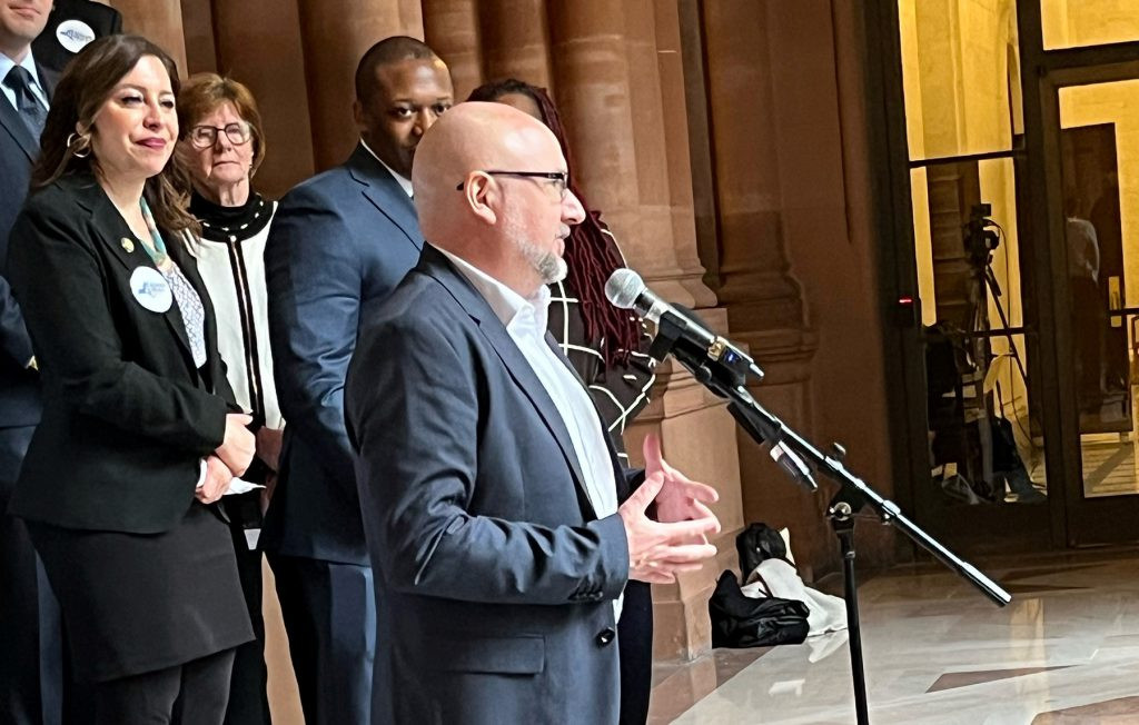 District Superintendent Chris Todd speaking at a legislative conference