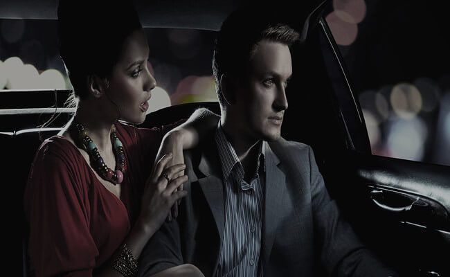 Business Professional in Corporate Limo