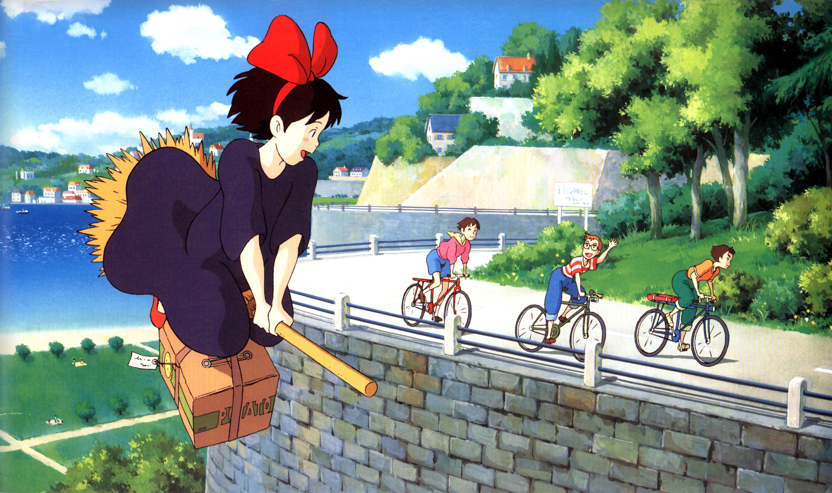 Kiki flying over the city in Kiki's Delivery Service