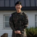 J-Hope of BTS poses for photographs after completing his military service at the 36th Infantry Division in Wonju, South Korea