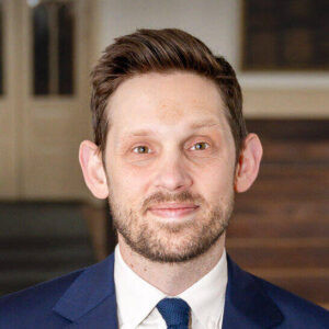 Rabbi Nathan Kamesar, leading services at Society Hill Synagogue and fostering a vibrant Jewish community in Philadelphia.