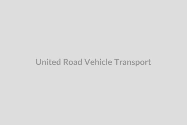 United Road truck transporting vehicles