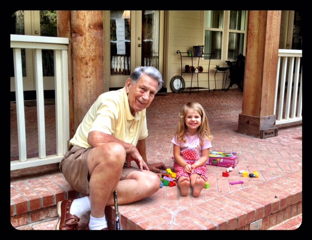 John Moore with his great-granddaughter Annabeth.