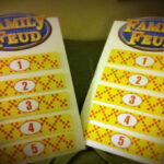Completed Family Feud Game Board with Logo and Answer Covers
