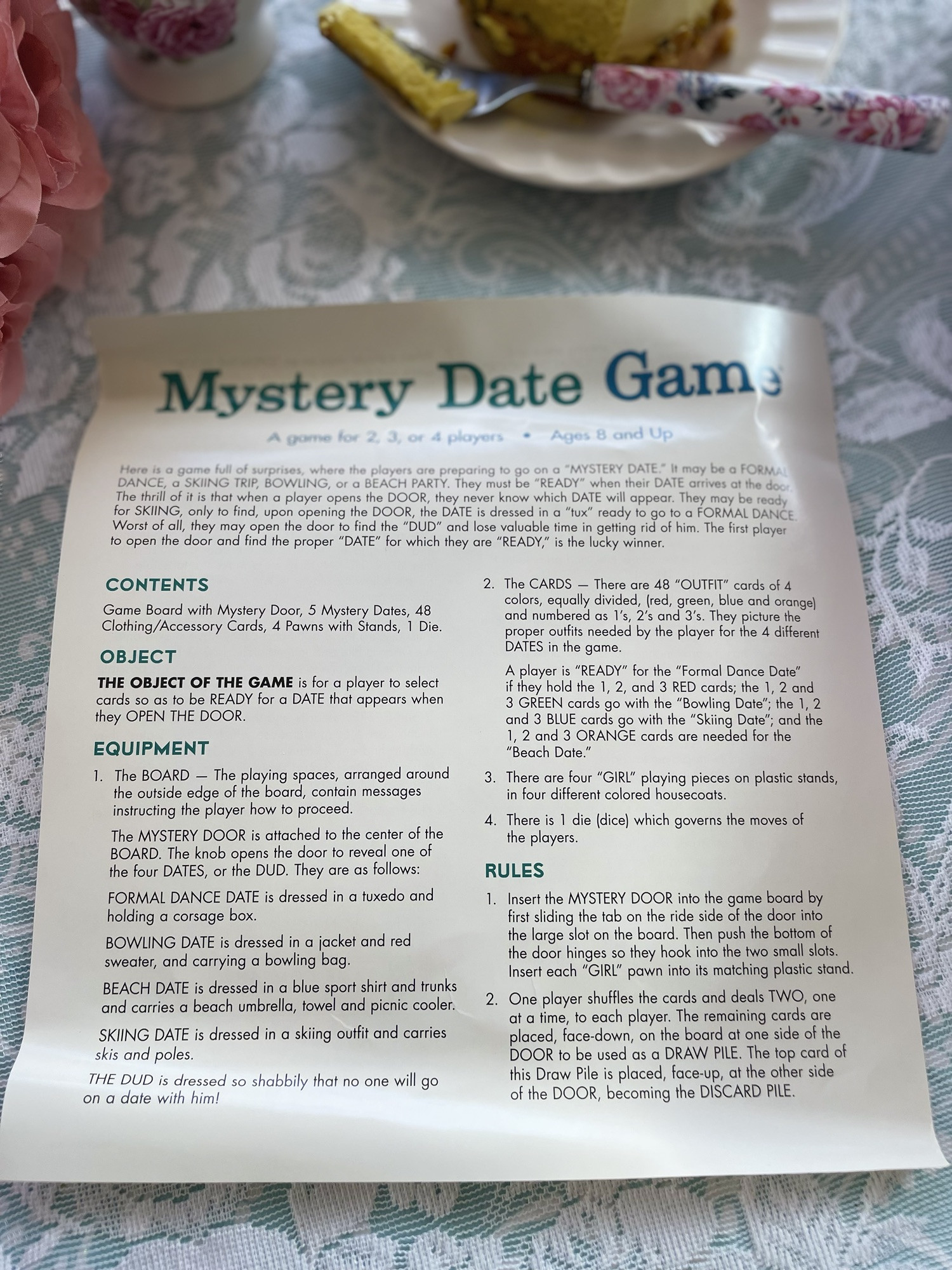 The interior of the Mystery Date Game box, showcasing the various date options