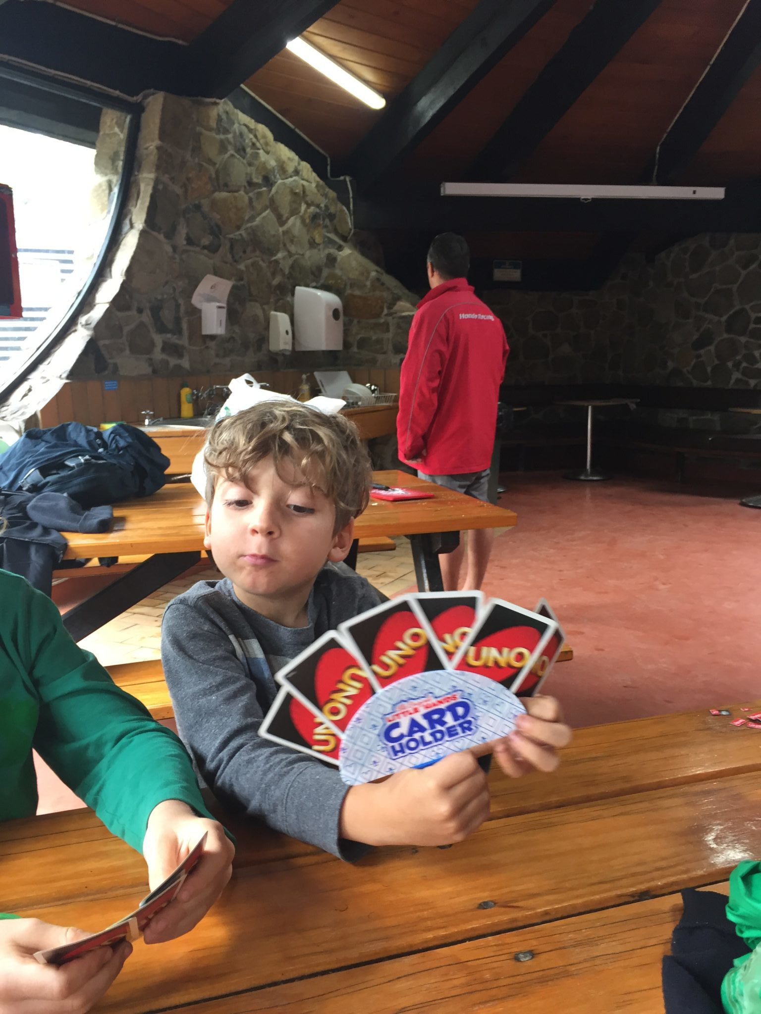 Child using a card holder