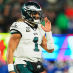 Philadelphia Eagles quarterback Jalen Hurts looks to pass