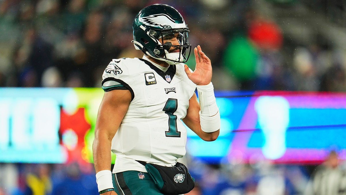 Philadelphia Eagles quarterback Jalen Hurts looks to pass