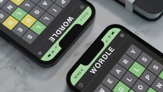 Wordle on smartphones showcasing gameplay and interface