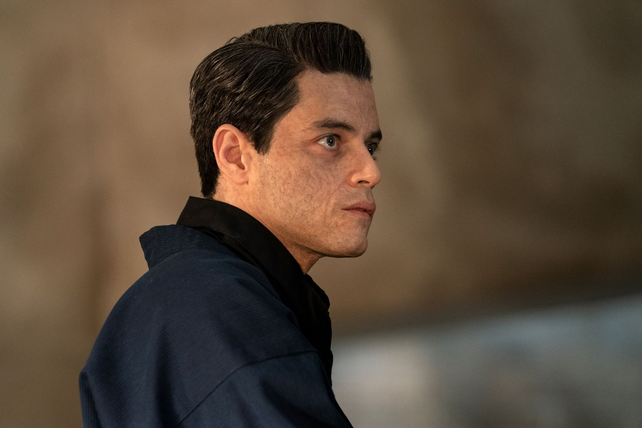 Rami Malek in No Time to Die looking serious