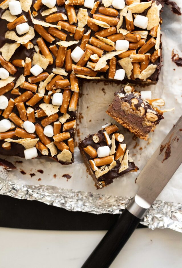 Super Bowl Bars on a pan with a knife