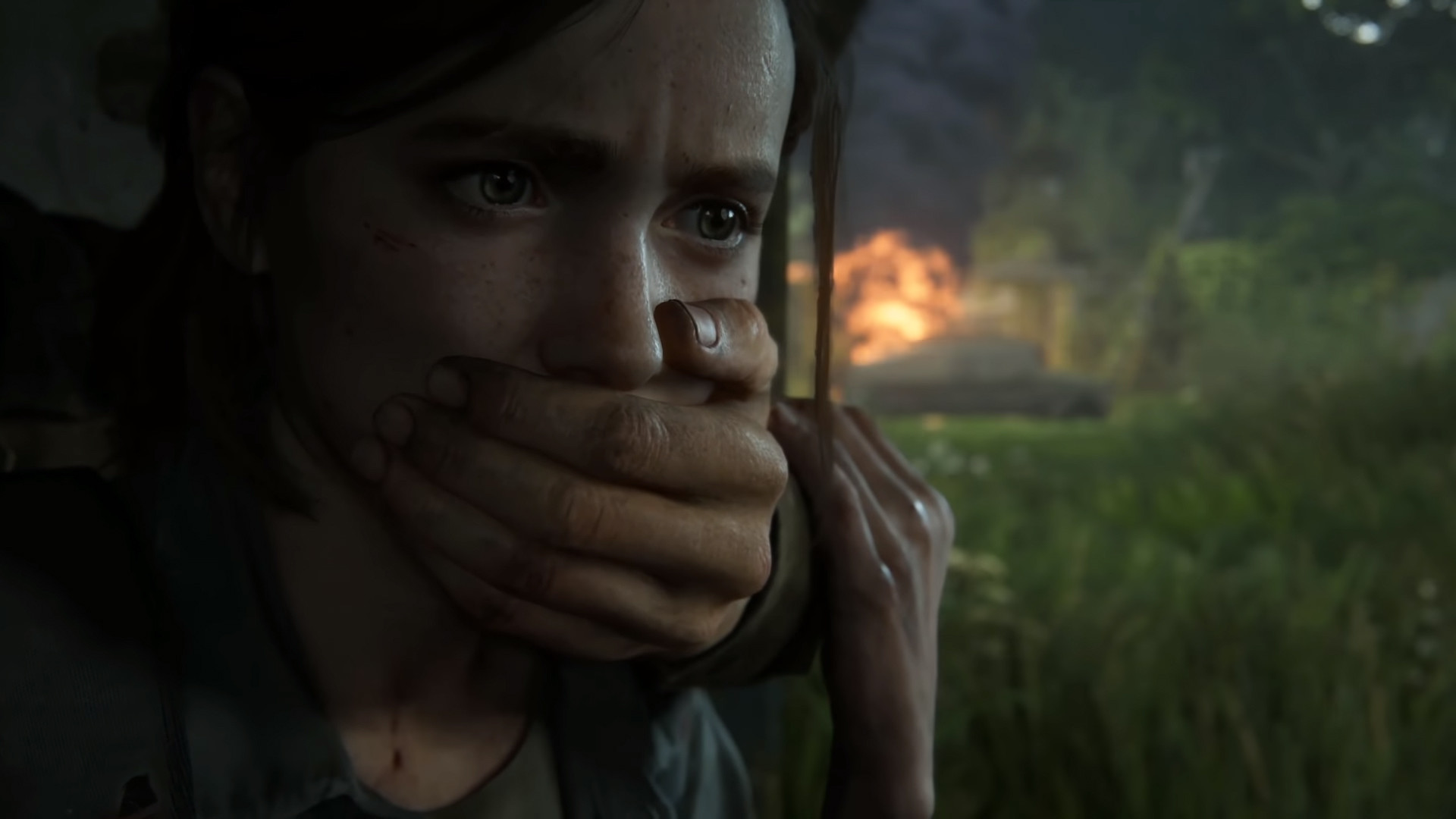 Ellie With Hand Covering Mouth