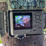 A screen showing someone adjusting the settings on a Bushnell Core S-4K No Glow trail camera.