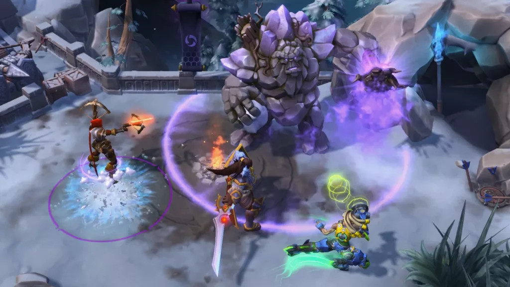Heroes of the Storm displaying a team fight with characters from Diablo and Overwatch, highlighting its crossover MOBA gameplay.