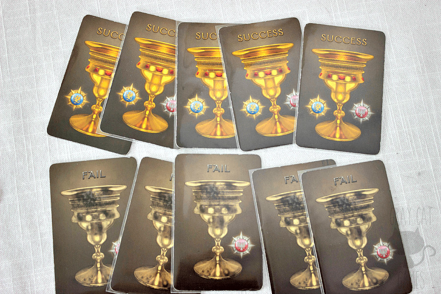 Avalon game cards showing success and fail options