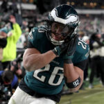 Saquon Barkley and the Philadelphia Eagles celebrating their Super Bowl berth