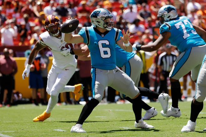 Cleveland Browns Quarterback Jacoby Brissett prepares to throw the ball during a game.
