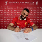 Mohamed Salah signs his new contract at Liverpool