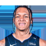 Orlando Magic Player Paolo Banchero in action, demonstrating athletic prowess and focus during an NBA game.