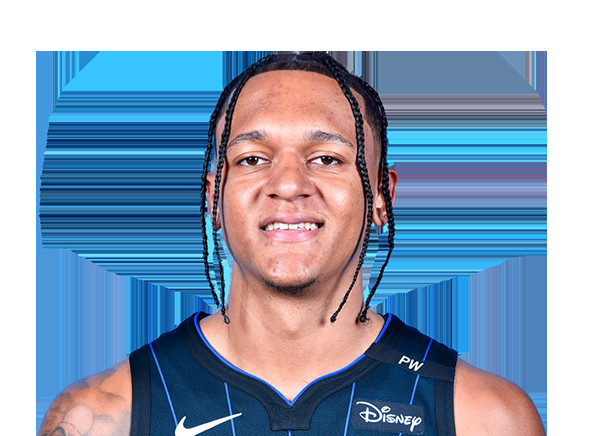 Orlando Magic Player Paolo Banchero in action, demonstrating athletic prowess and focus during an NBA game.