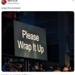 A photograph of a teleprompter at the 2023 Game Awards reading "Please Wrap It Up"