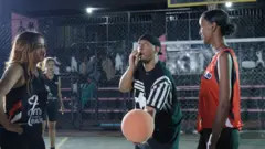 Messiah Hailemeskel acting as a referee