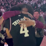 Texas A&M's Wade Taylor IV reaction to jersey in rafters at Reed Arena