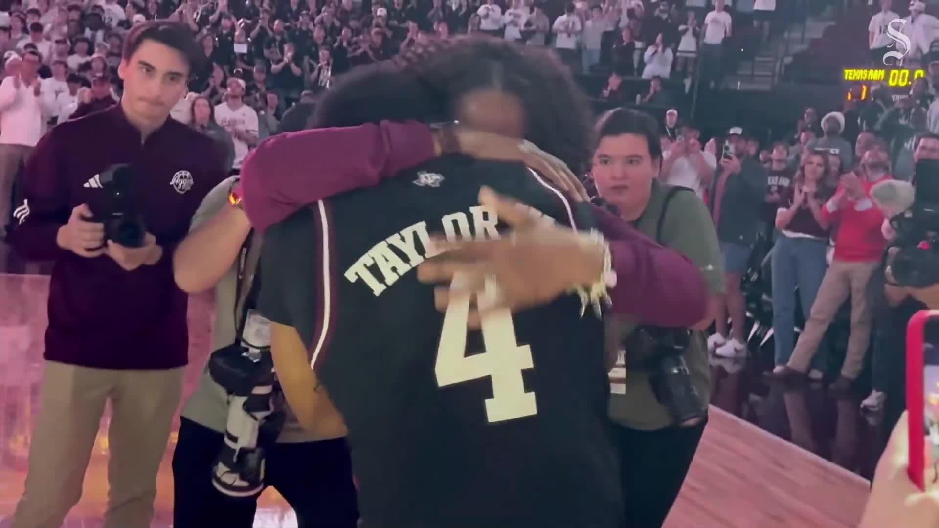 Texas A&M's Wade Taylor IV reaction to jersey in rafters at Reed Arena
