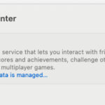 An iPhone displaying a game with the iOS Game Mode interface visible