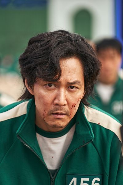 Lee Jung-jae as Seong Gi-hun, or player 456, in squid game season 1