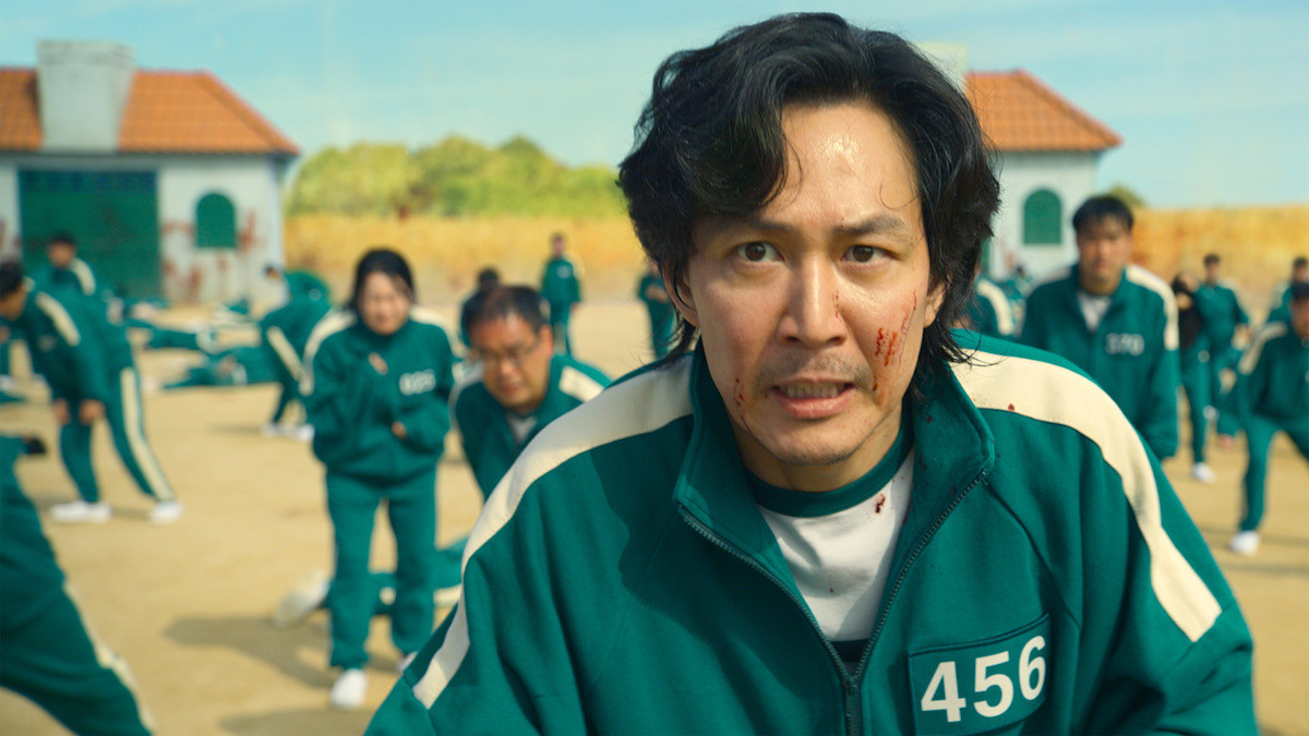 Lee Jung-jae as Seong Gi-hun during the red light green light game in Squid Game