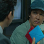 Gong Yoo as the Recruiter invites Seong Gi-hun to play Ddakji