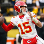 Kansas City Chiefs quarterback Patrick Mahomes (15) passes against the Pittsburgh Steelers during the first half of an NFL football game, Wednesday, Dec. 25, 2024, in Pittsburgh.