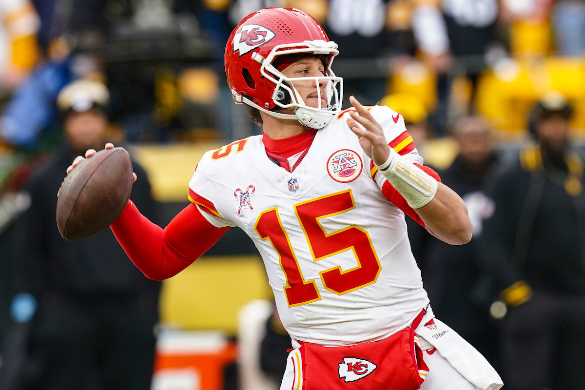Kansas City Chiefs quarterback Patrick Mahomes (15) passes against the Pittsburgh Steelers during the first half of an NFL football game, Wednesday, Dec. 25, 2024, in Pittsburgh.