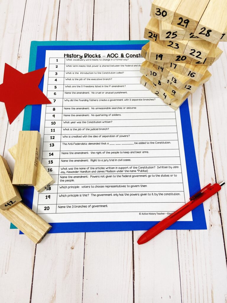 Jenga game blocks labeled with numbers for a review activity
