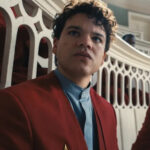 Josh Andrés Rivera as Sejanus Plinth, burdened with guilt, in The Hunger Games: The Ballad of Songbirds and Snakes