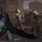 Batman surveying Arkham City from a rooftop, highlighting the expansive and detailed environment