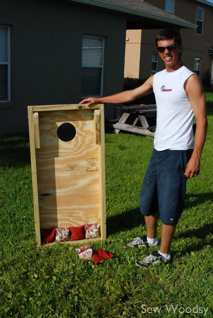 Mr. Woodsy poses with his latest woodworking creation– demonstrating how easy it is to store (the legs fold in).
