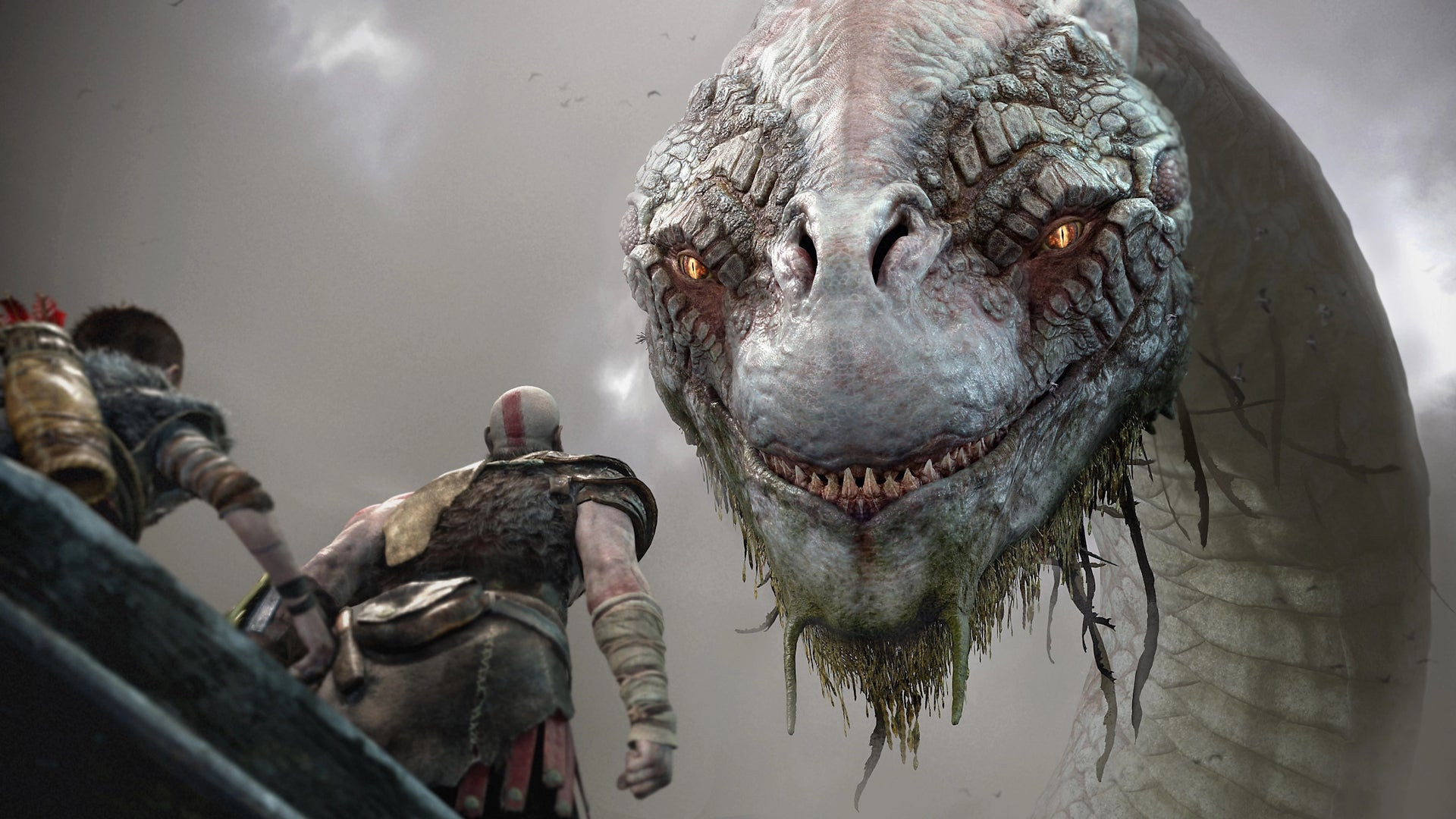 Kratos and Atreus look up at the giant serpent Jörmungandr.