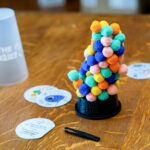 A close up of The Fuzzies board game showing the texture of the fuzz balls.