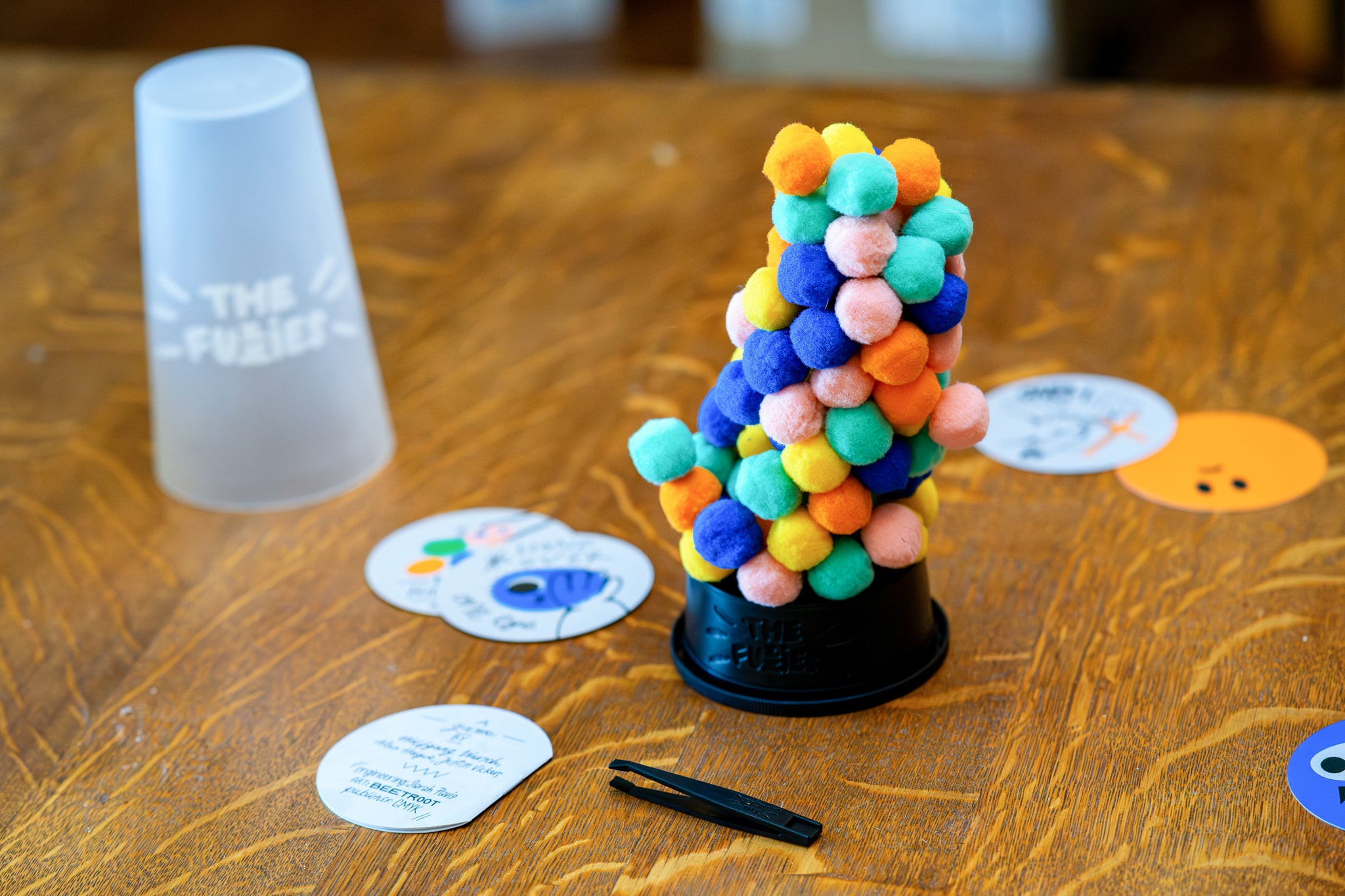 A close up of The Fuzzies board game showing the texture of the fuzz balls.