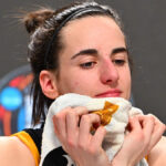 Caitlin Clark addresses reporters