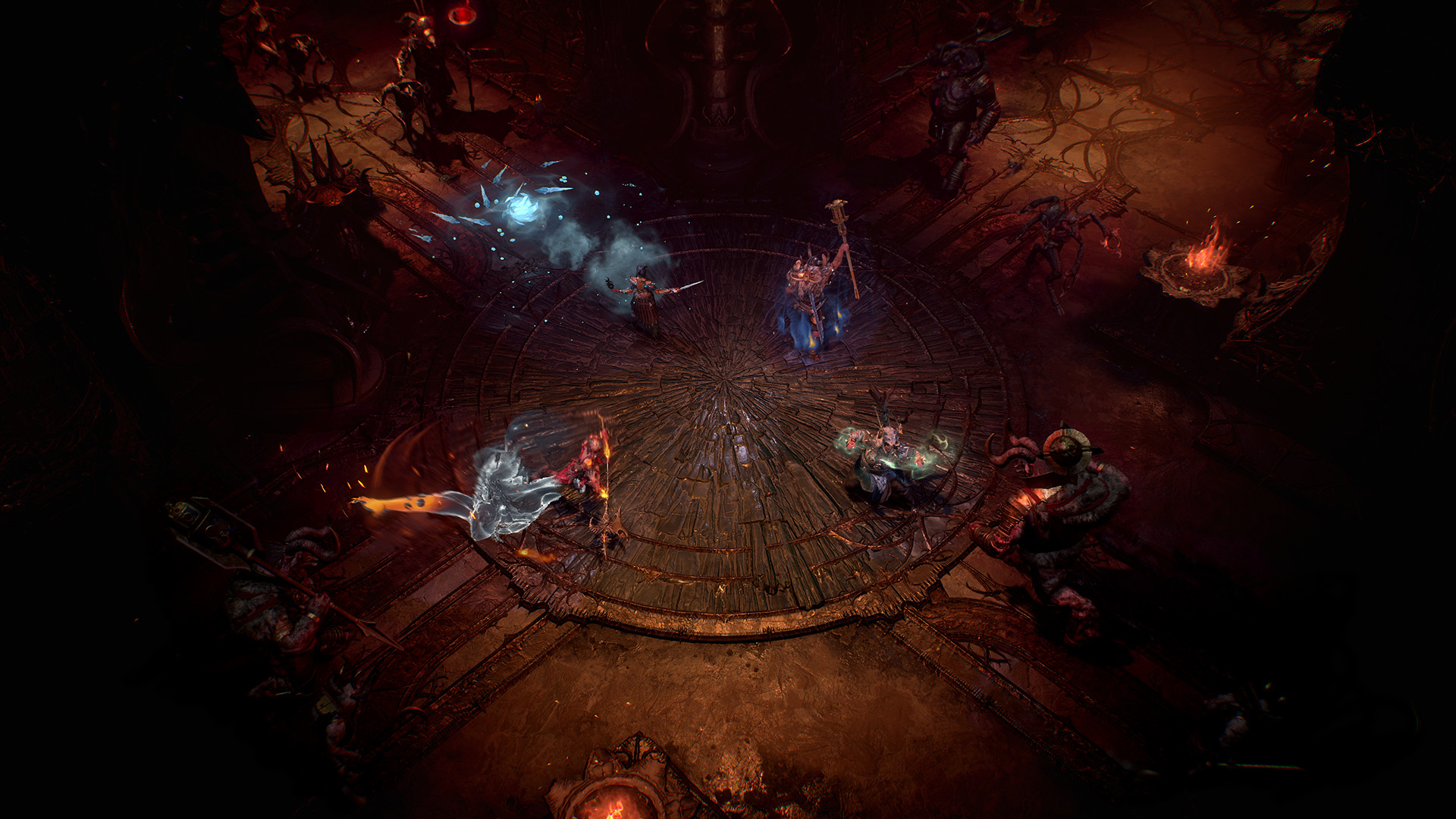 Four players stand back to back tackling enemies in Diablo 4’s Dark Citadel
