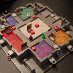 Clue board game setup with mini figurines and clue cards, ready for players to solve the classic whodunit mystery.